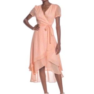 Betsy Johnson soft pink wrap dress on leopard print